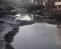 Ямы глубиной более 50 см, заполнены водой, тротуары отсутствуют, детям передвижение невозможно, с коляской не пройти