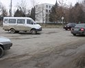 В Нальчике по улице Шогенова, от Калмыкова до Профсоюзной большое количество ям на дорожном полотне, замедляющих движение автотранспорта. Разрушение асфальтового полотна угрожает безопасности всех участников дорожного движения, отсутствие пешеходного перехода на пересечении улиц Калмыкова и Шогенова угрожает безопасности пешеходов, которые не имеют легальной возможности перейти улицу Шогенова на остановку общественного транспорта без нарушения ПДД.