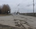 В Нальчике по улице Шогенова, от Калмыкова до Профсоюзной большое количество ям на дорожном полотне, замедляющих движение автотранспорта. Разрушение асфальтового полотна угрожает безопасности всех участников дорожного движения, отсутствие пешеходного перехода на пересечении улиц Калмыкова и Шогенова угрожает безопасности пешеходов, которые не имеют легальной возможности перейти улицу Шогенова на остановку общественного транспорта без нарушения ПДД.