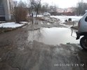 Большие ямы на въезде во двор.