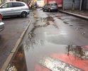 Во дворе глубокие аварийные ямы. Во время дождя наполняются водой, что не позволяет жителям нормально ходить по придомовой территории.