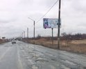 Важная городская транспортная артерия. А вместо дороги - ямы.