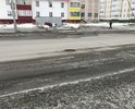 Вместе со снегом сошел и асфальт, по дороге можно ехать только посередине нарушая правила ПДД.