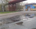 Большие ямы на повороте с ул. Мичурина в сторону Нефтехимовской трассы.