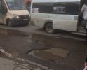 Яма на остановке со стороны Барса, в дождь образуется лужа, при наезде транспорта, разлетается на ожидающих транспорт людей.