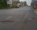 Выбоина  по комсомольскому проспекту, неподалеку от дома, расположенного по адресу  - Комсомольский 39