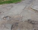 В Кировском районе по улице Брестской есть тротуар с парковочным карманом вдоль магазинов, почты,абонентского отдела и т.д.
По данной дороге не то, что ходить невозоможно, это просто опасно, т.к. огромные глубокие ямы по всей длине тротуара.
Аналогичная ситуация с подъездными путями около домов по адресам Знаменщикова, 51 и Знаменщикова, 53

В прошлом году решила разобраться с проблемой, в итоге Управление дорог и внешнего благоустройства ответило, что это не в их ведении, следует обращаться в Администрацию Кировского района.
Администрация Кировского района дала официальный ответ, что будет проведена работа с собственниками помещений на предмет самостоятельного ремонта дорог (что по закону они делать не обязаны) и будет направлен запрос в Управление дорог и внешнего благоустройства на предмет включения данной дороги в план работ на 2017 год. 
Как и ожидалось, в 2017 году ничего не поменялось, состояние дорог только ухудшилось. Управление дорог и внешнего благоустройства в смету на 2017 год данный участок не включало и продолжает настаивать, что это в зоне ответственности Администрации Кировского района.
С подъездными путями около домов ситуация аналогичная.
В дополнение ко всему в этом же районе по адресу переулок Свободный, 9 зимой были проведены работы по замене труб, половина дороги около дома была разрушена. Уже прошло пол года, но после окончания работ дорога не была заасфальтирована, как это обычно делают по окончании аналогичных работ, просто посыпали гравием.