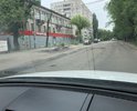 Примыкающая к центральному проспекту города улица, как после бомбёжки! Нужно исправить срочно.