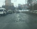 Асфальт на мосту, в сторону московского шоссе в огромных ямах