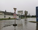 Лужи глубиной более 25 см, ямы размером более 1 метра, после дождей в течении недели стоит лужа длинной около 50 метров от перекрестка с ул.Волочаевской и ул.Миллера и такая же лужа на перекрестке с ул.Дзержинского.
Автомобилисты постоянно теряют номера, отрывают бампера и т.д.  Данная проблема существует на протяжении нескольких лет.