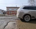 На отрезке дороги по ул.Мурзинскся от дома N15 до дома N26 дорога имеет множество ям глубина которых достигает 27 см. Асфальта уже нет, только глубокие ямы без возможности объезда.