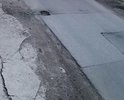 Плохое состояние дороги напротив домов 3, 4, 5 по Советской ул. в г. Красное Село, Санкт-Петербург. Дорога недавно ремонтировалась, но, после некачественной замены подземных коммуникаций, асфальтное покрытие быстро пришло в негодность.