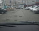 На отмеченном участке дороги улиц Чичерина и Лермонтова в пос. Трудовое сплошные ямы. В одном месте, на перекрестке этих улиц, провал на месте колодца.