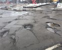 Перекрёсток Угличская и Белинского.
Вся дорога на перекрёстке разбита.