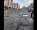 Напрочь убитая дорога в центре достаточно нового района « вертолётное поле». Весь посёлок, сотни автомобилей ездят по ней ежедневно. Каждый год все жители надеятся, что ее наконец-то заасфальтируют. Но нет. Этого не происходит. Ее немного подравняют, засыпят отходами асфальтового производства и все. Все!!!!!!!! И никому до этого дела нет. Это же Россия. Не удивлюсь если по бумагам асфальт положен несколько лет назад, деньги разворованы. Вот и посыпают каждый год тырсой.